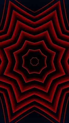 red and black background with star pattern in the center. kaleidoscope vj loop vertical