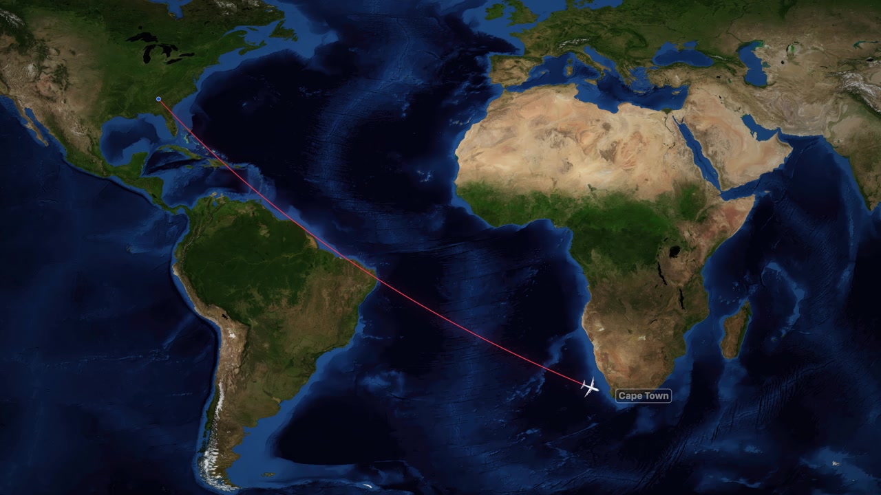 Animated red line tracks airplane flying from Atlanta to Cape Town across world map