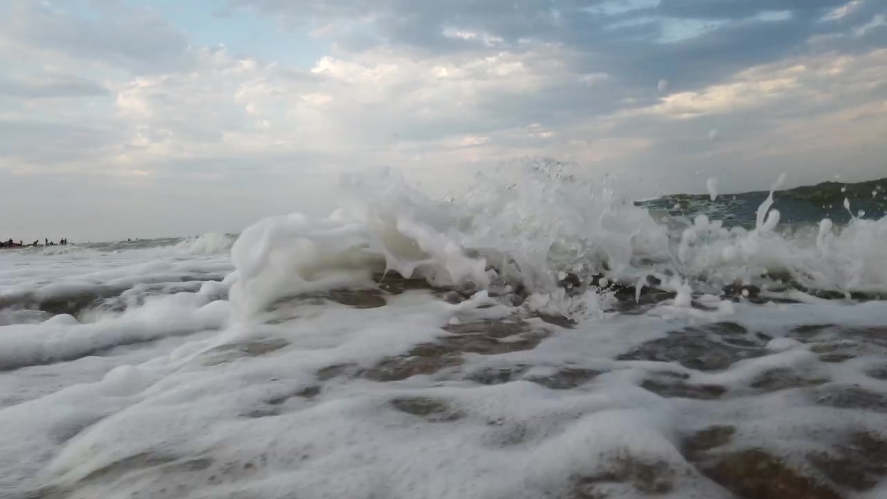 Sea wave on the beach in summer.