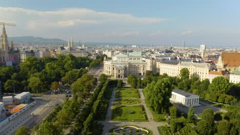 pullback away from vienna's rose garden with government buildings in background