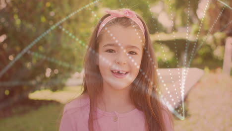in school, girl with pink headband watching animation with digital light patterns