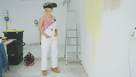 Female-painter-enjoying-virtual-reality-headset-