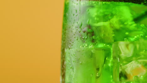 Close-up of a Cold Green Drink with Ice