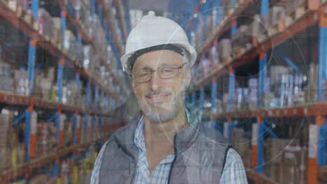 composite video of surveillance camera over caucasian male senior supervisor smiling at warehouse