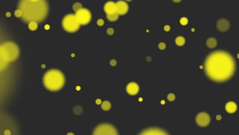 Fly-abstract-yellow-particles-and-glitters-on-black-gradient-1