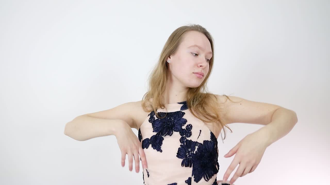 Young Woman in a Pink Floral Dress