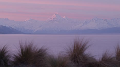 tranquil evening with purple sunset at lake pukaki