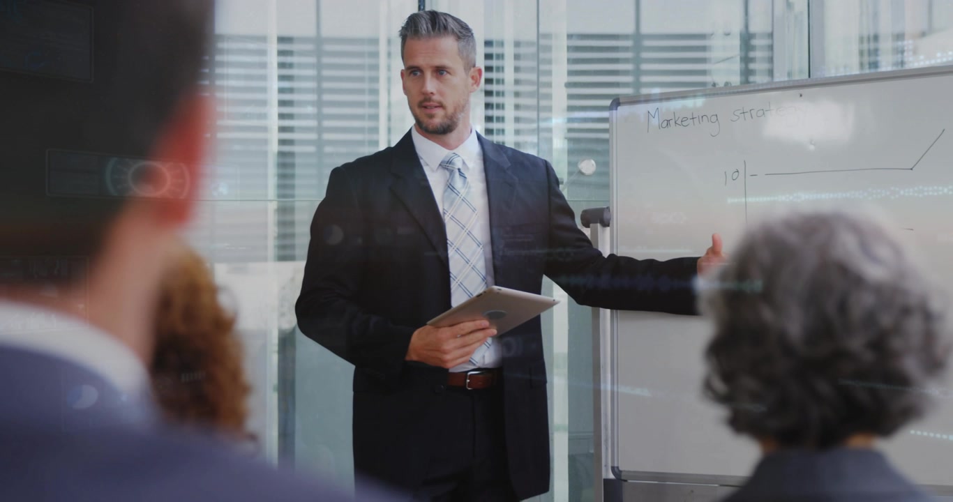 Businessman Presenting Marketing Strategy with Digital Overlay in Office Meeting