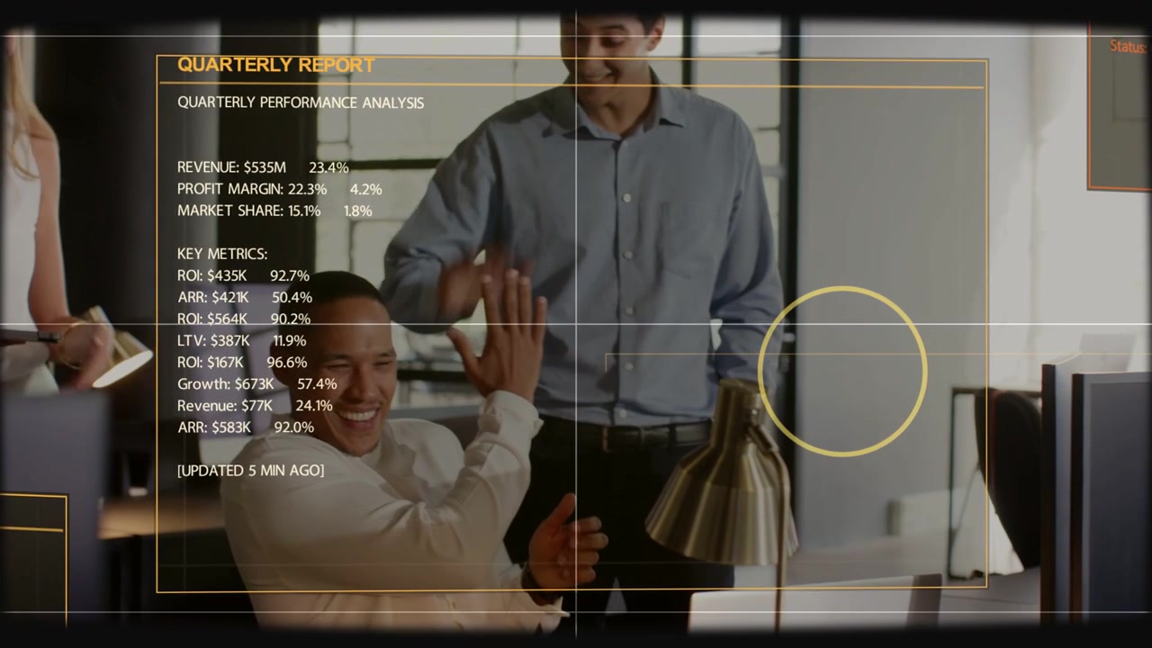 Man at desk reviewing laptop HUD appearing with strong finance metrics and yellow dot team cheering