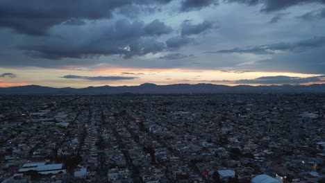 Soaring-over-Ecatepec-sunrise,-borders-with-Mexico-City