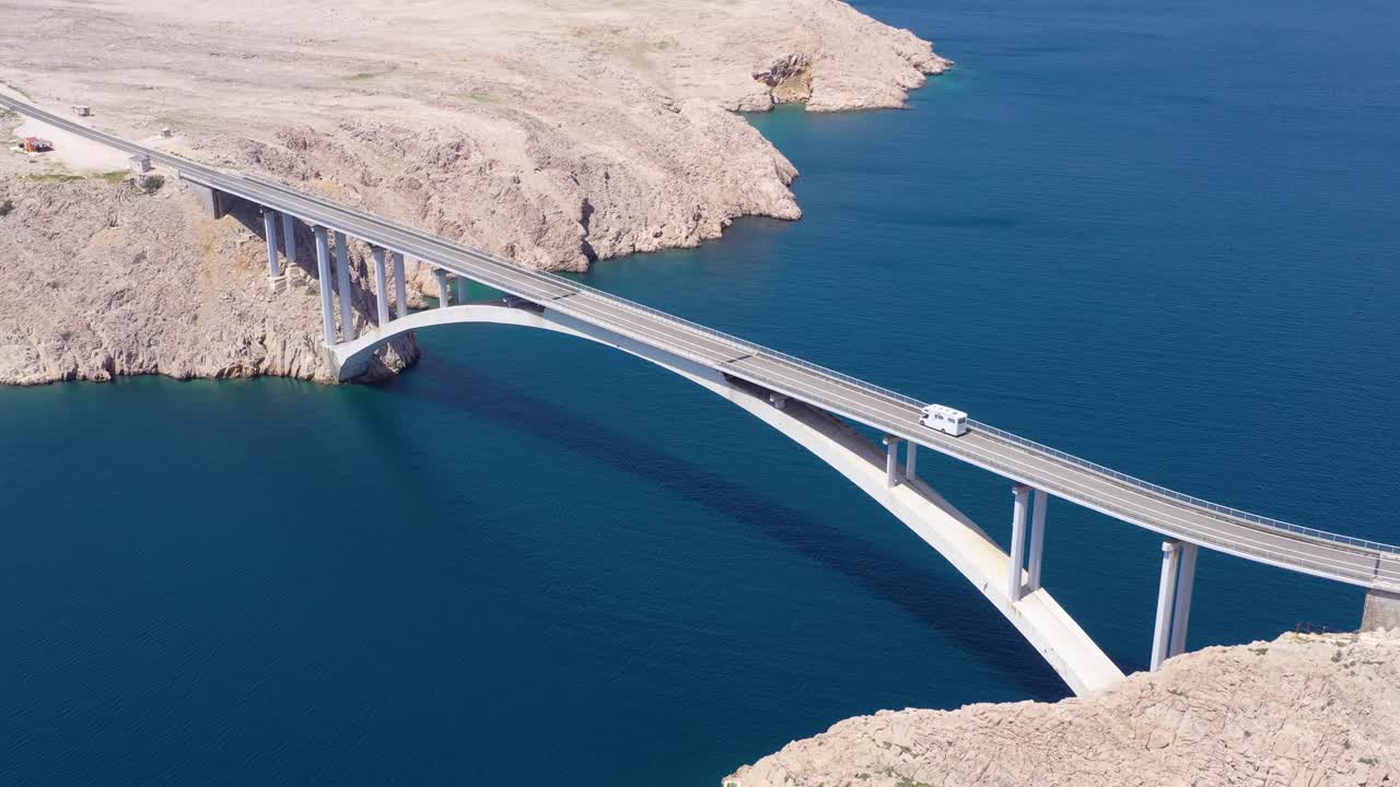 tourist van crossing bridge connecting Island of Pag to Croatia. Tranquillity