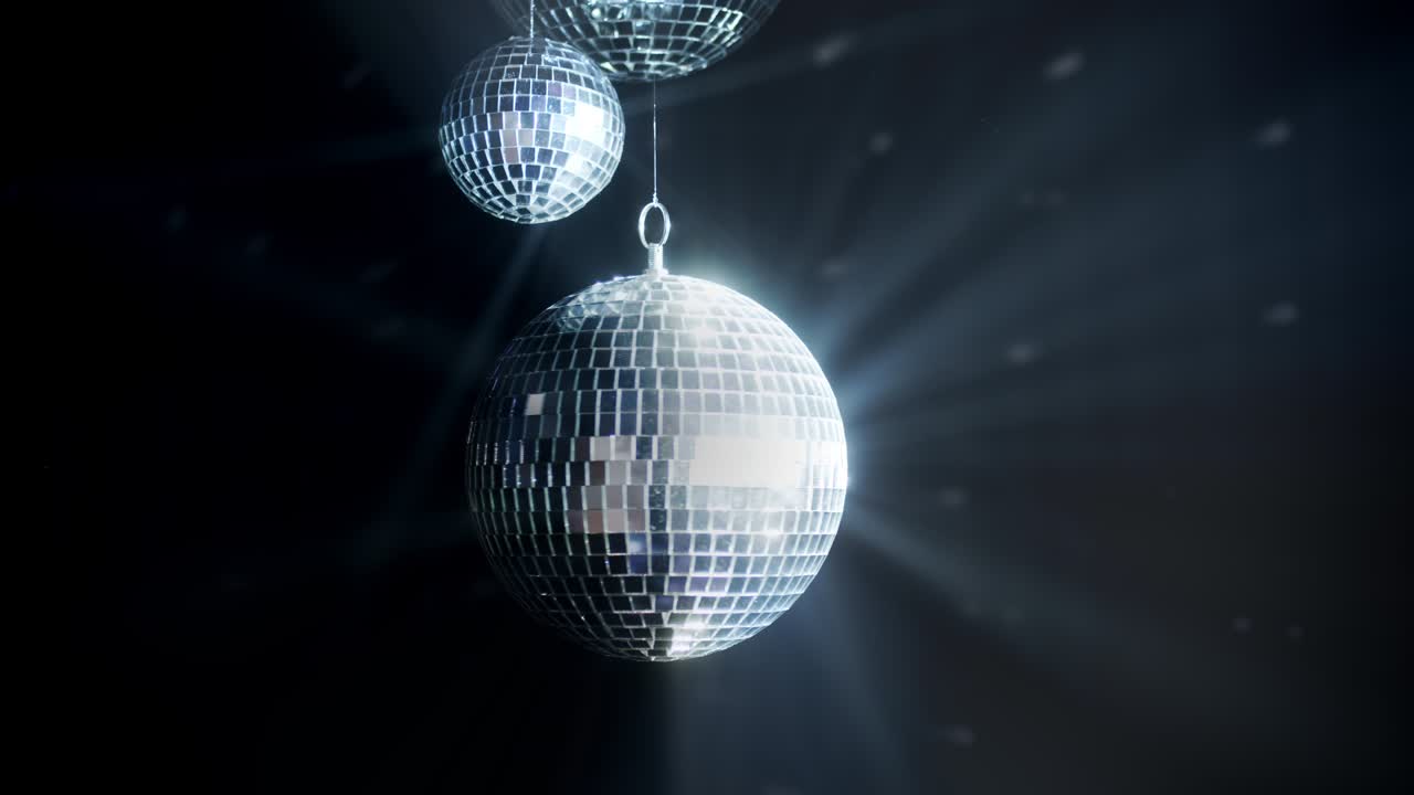 Disco mirror ball in the center of the smoke.