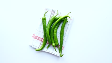 green chili peppers on a napkin