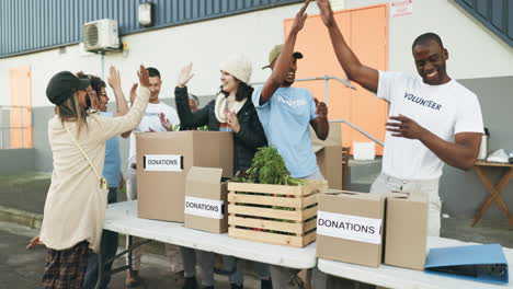 people volunteering, high five