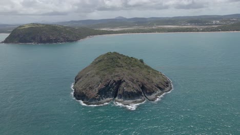 bluff rock island with panoramic view of turtle lookout, capricorn coast national park, and kemp beach in rosslyn, qld, australia