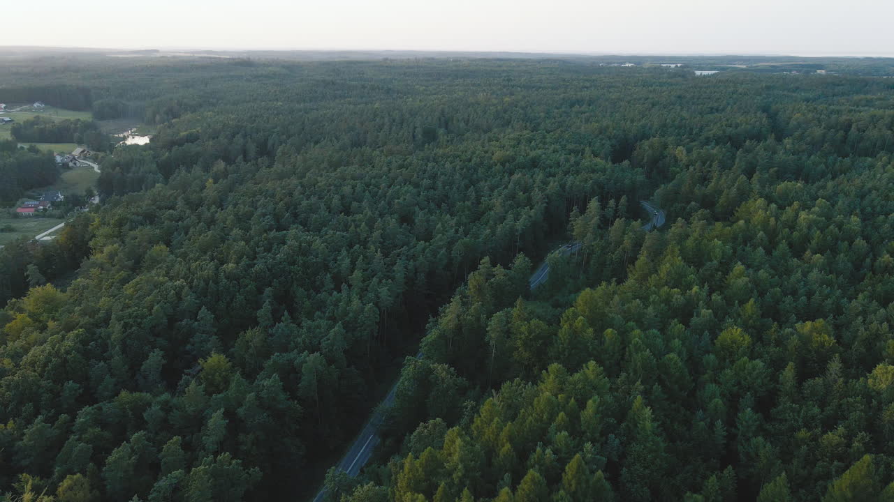 Birds eye drone footage over Koleczkowo in Poland. Northern european landscape