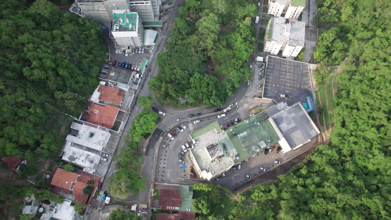 Aerial view over Caurimare, Caracas, moving towards Petare, green landscape