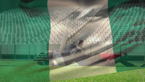 animation of nigerian flag over african american man chasing player with rugby ball on ground