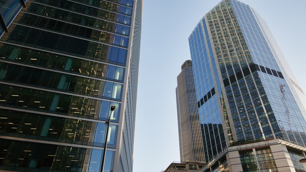 Low angle view of modern glass skyscrapers in the heart of London's financial district