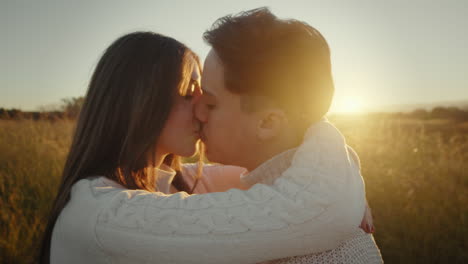 couple kissing outdoors for valentine's day