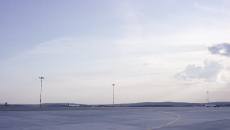 empty airport runway at dawn/dusk