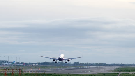 static shot commercial passenger air plane touchdown arrival