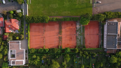 aerial view of tennis courts and surrounding area