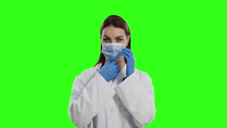Doctora-Caucásica-Con-Máscara-Facial-Sobre-Fondo-De-Pantalla-Verde