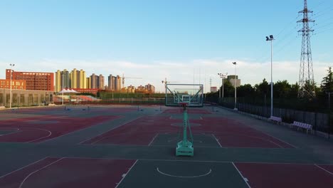 Empty-Basketball-courts-at-Beijing-Jiaotong-University-Weihai-campus,-China