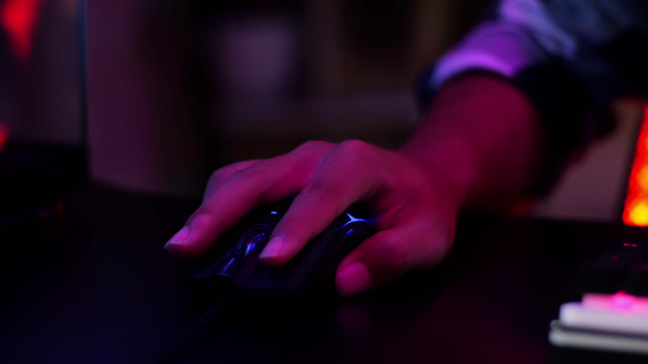 Close Up Of Pro Cyber Sport Gamer Play Game With Mouse