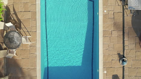 birds eye view of a countryside home with a pool