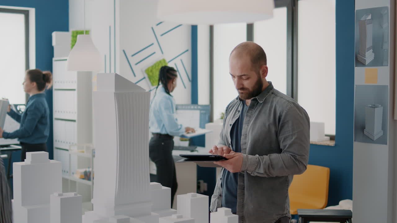 People working on architecture and urban planning in the office