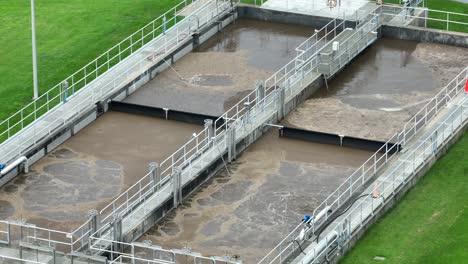 sewage in filtration tanks at wastewater treatment plant in usa