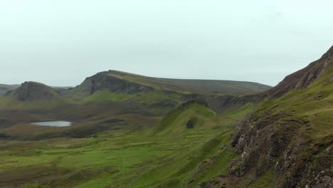 Stunning Aerial footage of the beautiful Quiraing landscape on the Isle of Skye, Scotland, UK. The Quiraing Landslip is on the northernmost summit of the Trotternish on the Isle of Skye, Scotland.
