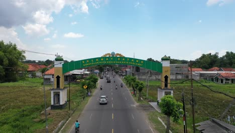 aerial view of the welcome monument to the city of bangkalan, the city of islamic boarding school students in madura, east java