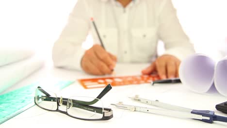 architect man drawing sketch lines with ruler