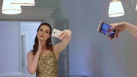 woman taking selfie in bathroom