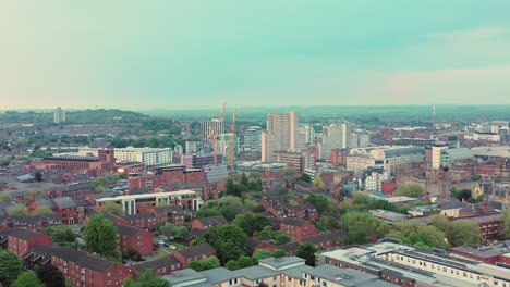 aerial shot flying over the city of nottingham in england on a summer day