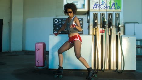 cool roller skating woman dances and skates outside in an urban setting