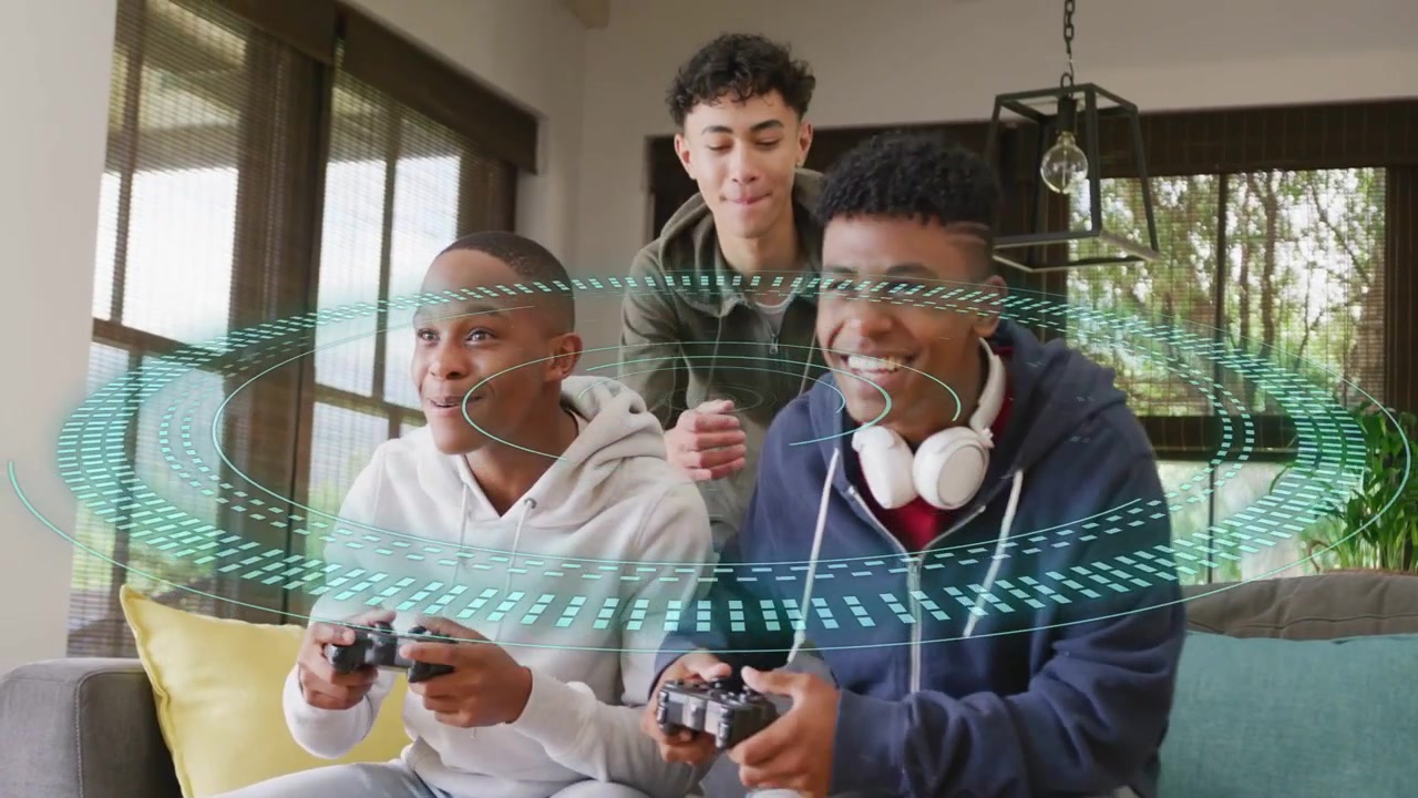 Vertical video: Game starting creating teal rings three boys leaning on couch gripping pads playing