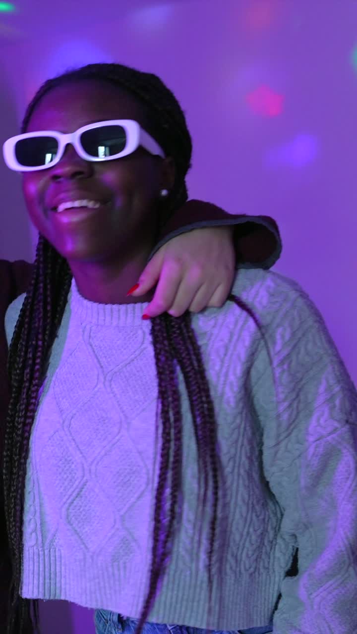 Two women having fun at a party