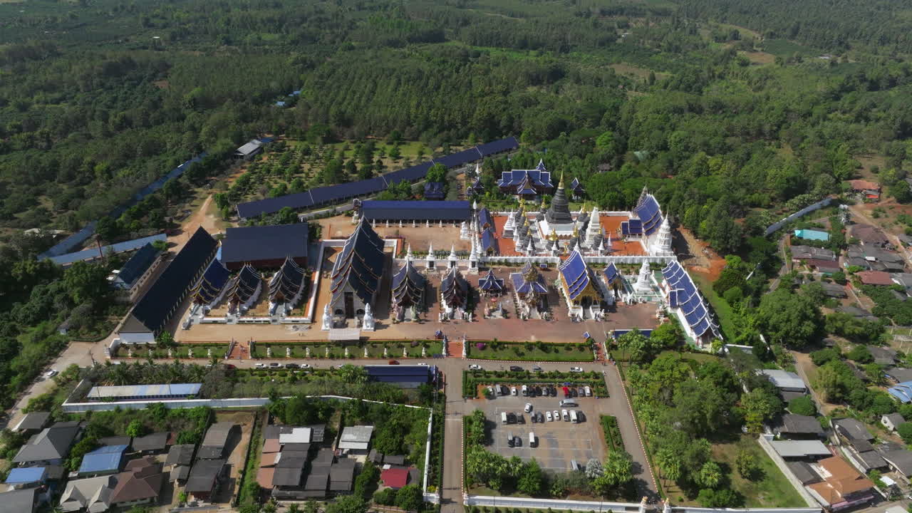 Monastery Complex At Wat Den Sali Si Mueang Kaen Buddhist Temple In Chiang Mai, Thailand. - aerial shot