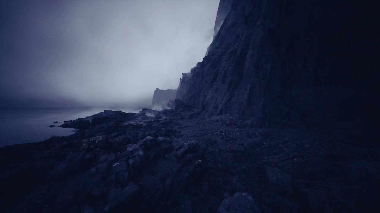 Ancient seaside precipice scene enveloped in mist during twilight hour