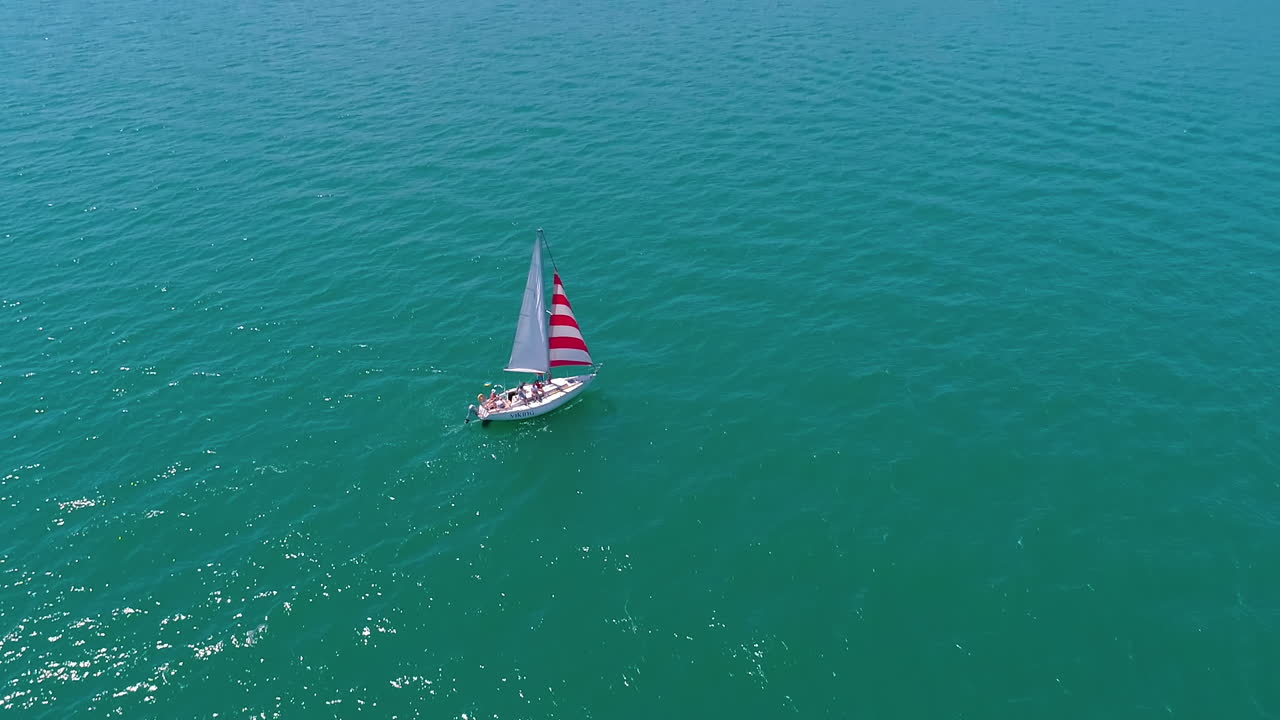 Seascape with sail boat. Nature seascape with sail boat cruising at sea bay