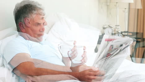 Man-reading-a-newspaper-in-his-bed