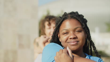 Medium-shot-of-peaceful-Afro-American-girl-stretching-arms