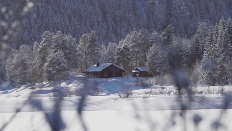 Cabins-On-Snowy-Landscape-In-Indre-Fosen,-Norway---wide