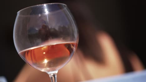 Closeup-of-a-glass-filled-with-rose-wine