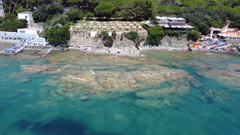 orbiting view of cardellino private beach building, castiglioncello