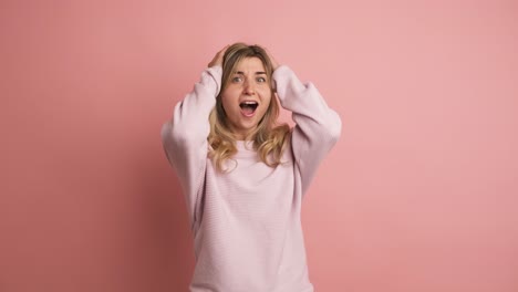 blonde young caucasian woman gesturing surprise